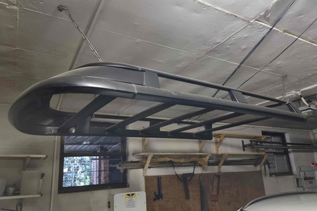 Roofrack and luggage retainer