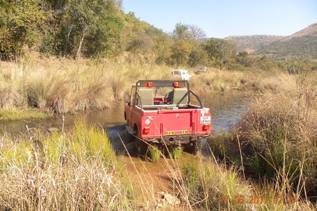 Jaco Prinsloo crossing a river in his Series 2A SW